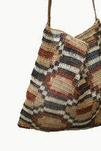 Load image into Gallery viewer, Close up of Cream and Brown Patterned Chaguar Bandoleer with Brown Strap.
