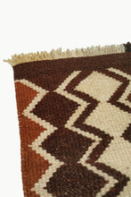 Load image into Gallery viewer, Close up of Dark Brown Special Size Wool Tapestry with Cream and Ochre Design details with Fringe ends.
